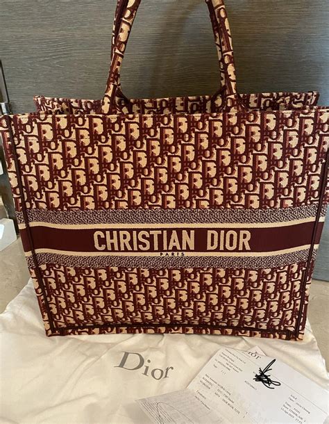 red christian dior tote|Christian Dior toile bag.